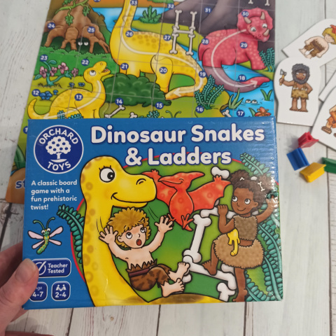 DINOSAUR SNAKES AND LADDERS Orchard Toys DINOSAUR SNAKES AND LADDERS Orchard Toys