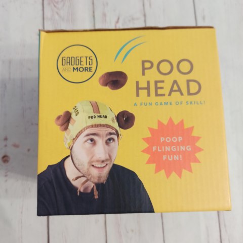 Poo Head Gra na Łapanie kupek na głowie