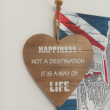 Tabliczka "Happiness is not a destination It is a way of life" do powieszenia