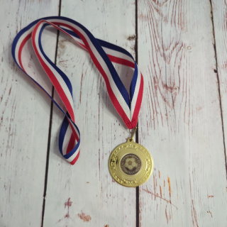 Medal piłkarski MAN OF THE MATCH - złoty z gwiazdkami