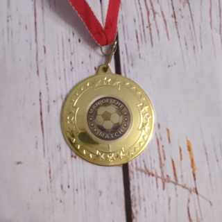 Medal piłkarski MAN OF THE MATCH - złoty z gwiazdkami