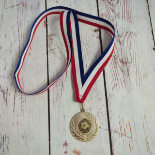 Medal piłkarski MAN OF THE MATCH - złoty z listkami